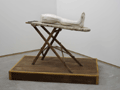 STUART BRISLEY, Louise Bourgeois' Leg, 2002, Performance Object <br />
Plaster, ironing board, wood